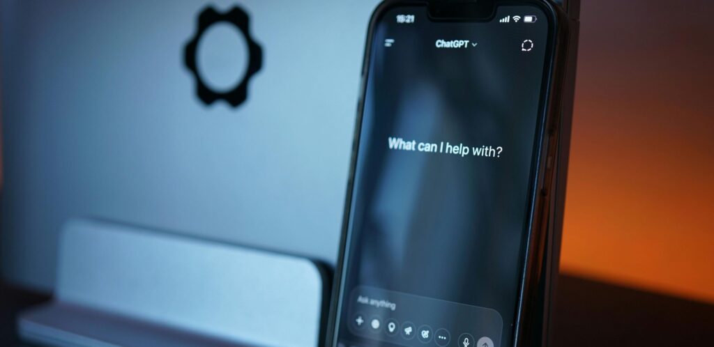 Smartphone screen showing ChatGPT interface as an example of AI tools for customer retention and customer support