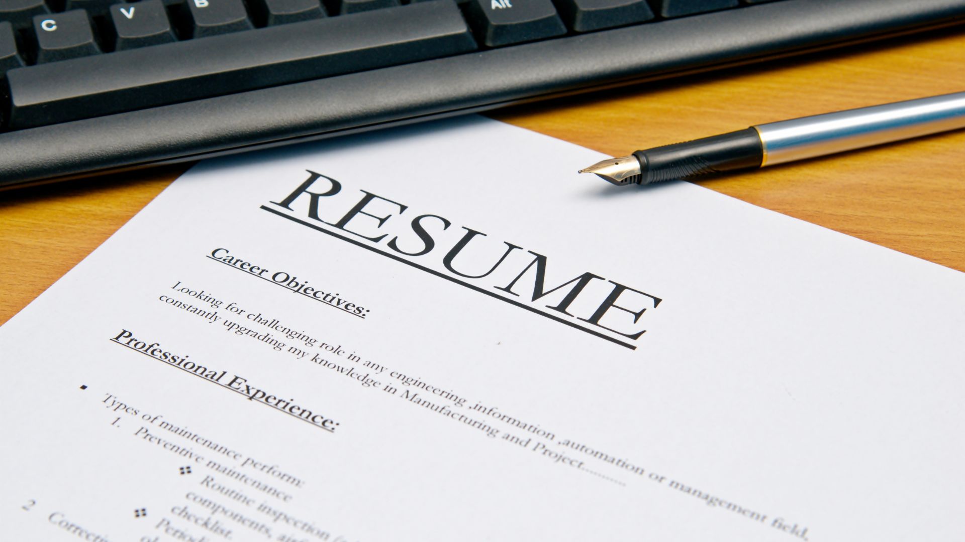 Résumé being screened by AI hiring tools before a human reviewer sees it