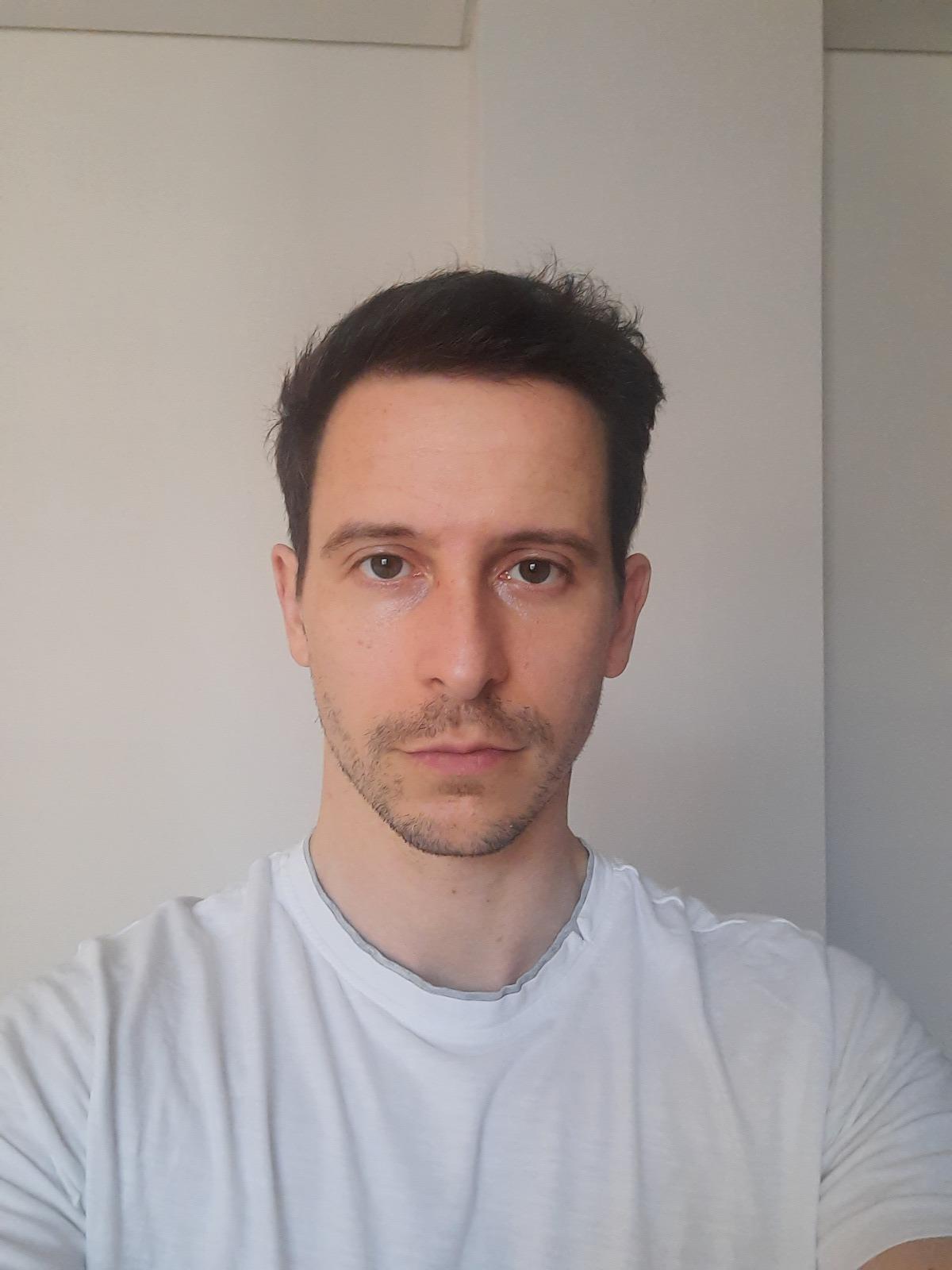 My original selfie before testing AI image editors